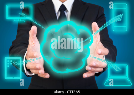 Businessman holding graphic of cloud computing Stock Photo