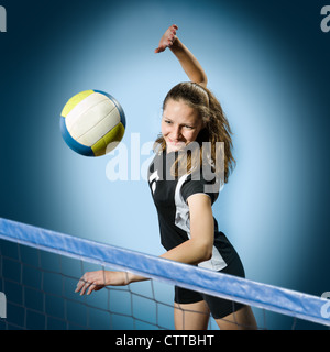 female volleyball player with a ball Stock Photo