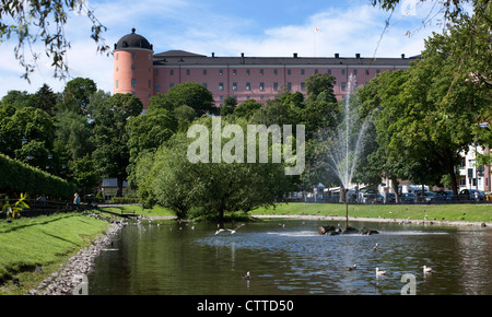 Water fountains in the Svandammen park below Uppsala Castle. Sweden. Stock Photo