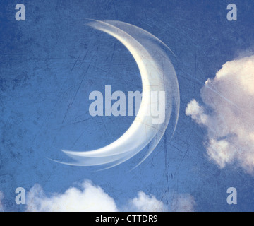 A fantasy cloudscape a crescent moon between clouds. Stock Photo
