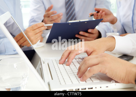 Close-up of male hands typing on the laptop keyboard Stock Photo