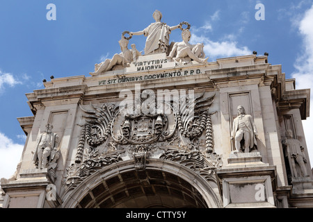 Sculptures on the top of the Arco da Rua Augusta in Lisbon, Portugal. Stock Photo