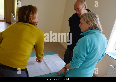 People planning a house conversion Stock Photo