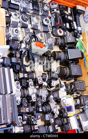 Collectible old cameras for sale in El Rastro flea market in Madrid, Spain Stock Photo