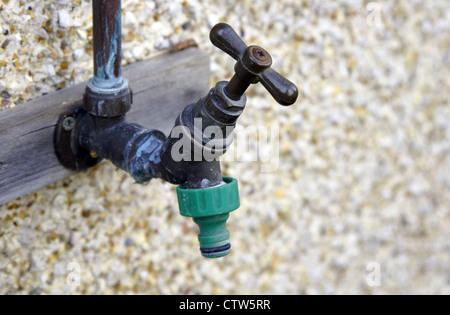 Wall mounted outdoor tap Stock Photo