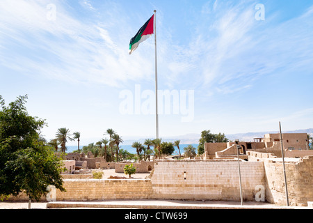 The Aqaba Flagpole under ruins of medieval Mamluks Aqaba fort Stock Photo