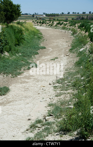 Amity Canal went dry due to drought in Lamar, Colorado. Stock Photo