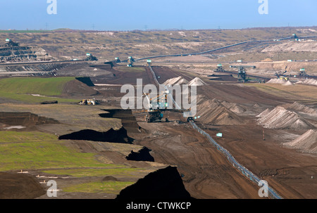 Brown coal / lignite being extracted by huge bucket-wheel excavators at open-pit mine, Saxony-Anhalt, Germany Stock Photo