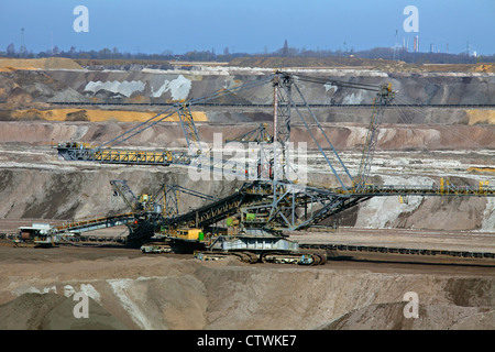 Brown coal / lignite being extracted by huge excavators at open-pit mine, Saxony-Anhalt, Germany Stock Photo