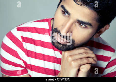 Portrait of a pensive young man Stock Photo