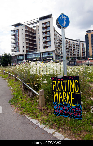 Westfield Student Village accommodation & Floating Market sign, Mile End Park, by the Regent’s Canal, London, UK. Stock Photo