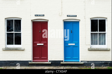 Quirky english colourful front doors and house names. The Noggin and the Nutshell. Eardisland. Herefordshire, England Stock Photo