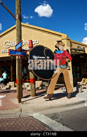Cowboy cutout figure welcome sign Main Street Old Town Scottsdale historical district Stock Photo