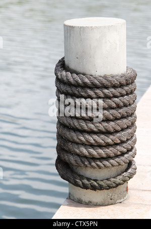 Thick Twine Rope Wrapped Around a Wooden Post Stock Image - Image