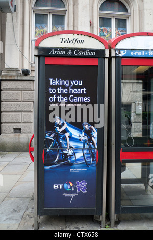 2012 London Olympics Brownlee brothers cycling sponsorship by BT British Telecom on phone boxes in Cardiff City Centre Wales UK  KATHY DEWITT Stock Photo