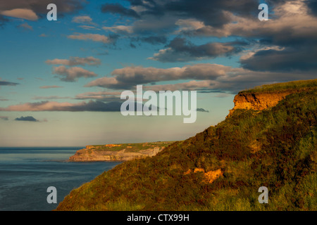 A seascape of the Yorkshire coast taken in Staithes looking towards Port Mulgrave, Kettleness and Whitby Stock Photo