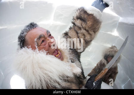 building an iglo on the north pole Stock Photo