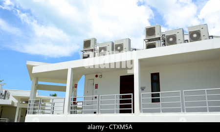 Compressor of air condition are set on platfrom of the building Stock Photo