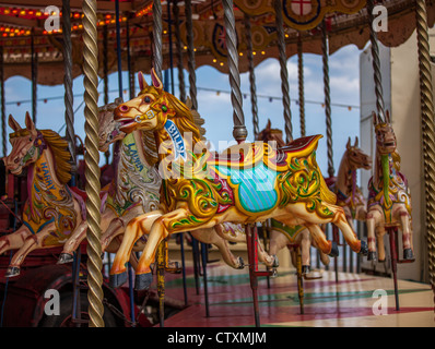 billy the carousel horse on fairground ride Stock Photo