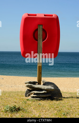 Life saving post on Loe bar beach Cornwall UK Stock Photo