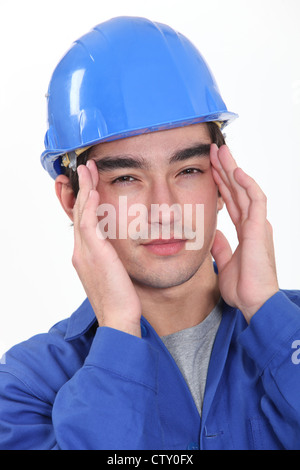 Builder suffering from headache Stock Photo