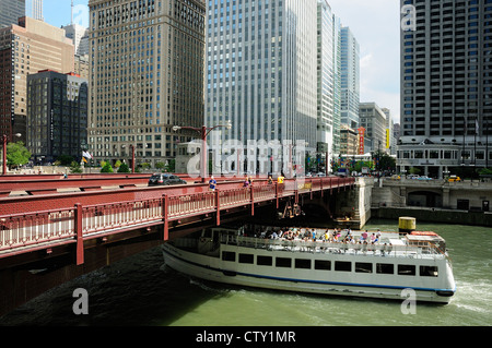 Chicago Architectural tour boat loaded with tourists cruising the Chicago River. Stock Photo