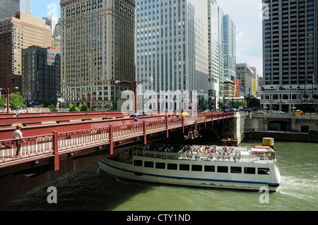 Chicago Architectural tour boat loaded with tourists cruising the Chicago River. Stock Photo