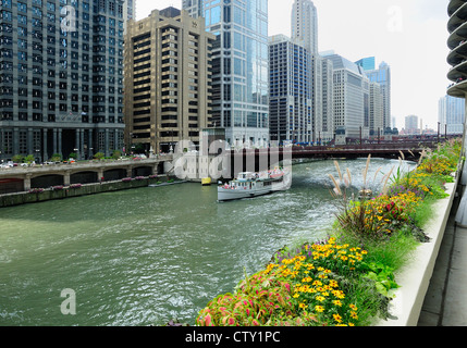 Chicago Architectural tour boat loaded with tourists cruising the Chicago River. Stock Photo