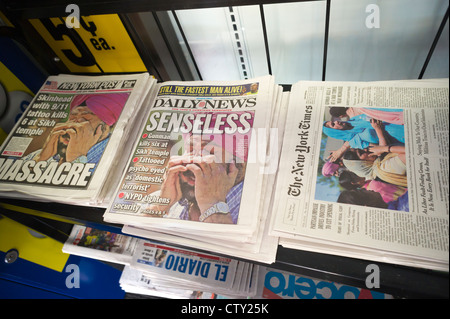 New York daily newspapers report on the shooting in a Sikh temple Stock Photo