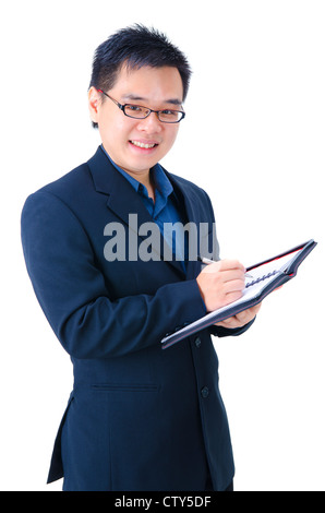 Asian young man take note on clipboard Stock Photo - Alamy