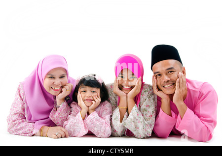 malay family in traditional malay clothing Stock Photo