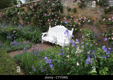 The peaceful setting of a walled garden in England Stock Photo