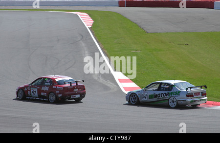 Alfa Romeo 156 followed by Nissan Primera at at Fujifilm Touring Car Trophy 1970-2000 Silverstone Classic July 22 2012 Stock Photo