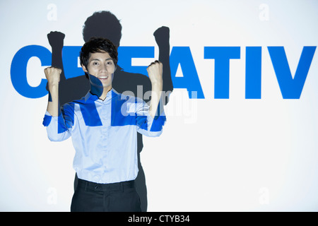 A man with 'creative' presentation slide Stock Photo - Alamy