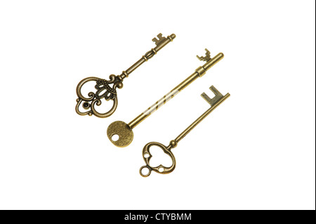 Group of old keys isolated on white background Stock Photo