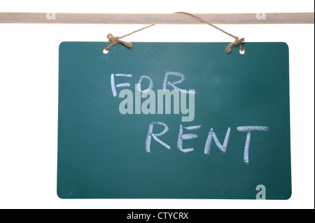 For rent sign on chalkboard isolated on white background Stock Photo
