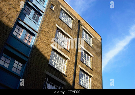 London regeneration. Victorian warehouses in the dockland area reconverted in expensive flats. Stock Photo