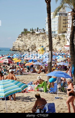 vacationers on Levante Beach in Benidorm, Spain Stock Photo