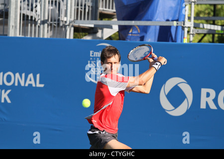 man playing tennis backhand return Stock Photo