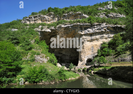 River running through the Porte de l'Arize, entrance of the prehistoric cave Mas-d'Azil, Midi-Pyrénées, Pyrenees, France Stock Photo