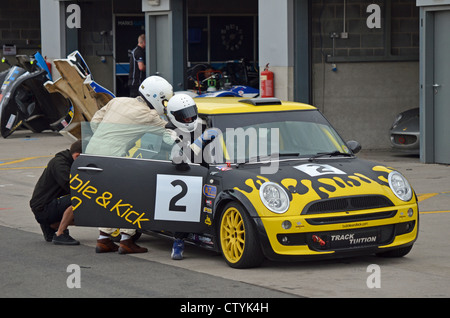 Pitstop and driver change for Mini at Mini Challenge Donington Park August 2011 Stock Photo