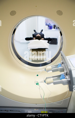 Female patient on MRI scanner Stock Photo