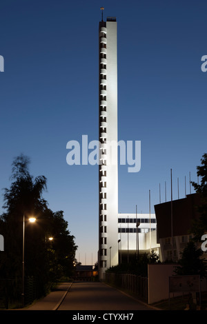 Modern tower on city street Stock Photo