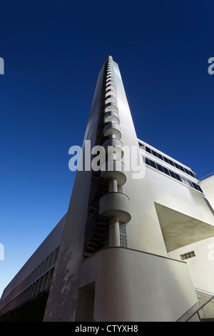 Modern tower on city street Stock Photo