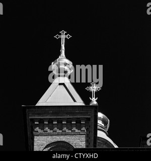 Ornate crosses on church towers Stock Photo