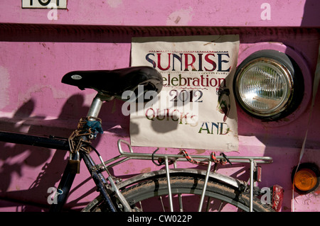 Detail of bicycle on pink sign at the Port Eliot Literary Festival St Germans Cornwall UK Stock Photo