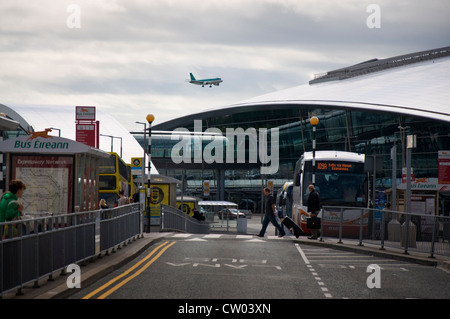 Dublin Airport an Aer Lingus plane lands by Terminal Two Stock Photo