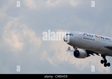 Airplane on a landing path Stock Photo