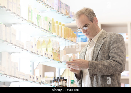 Man shopping in pharmacy Stock Photo