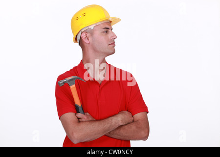 Handy man stood with his arms crossed Stock Photo